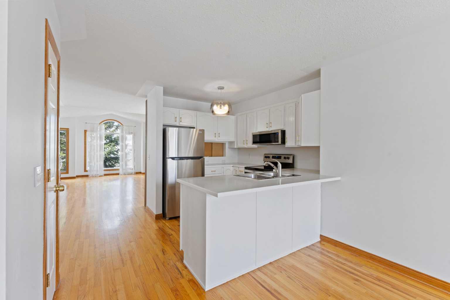 9095 Scurfield Dr NW, Calgary, AB T3L 1L3