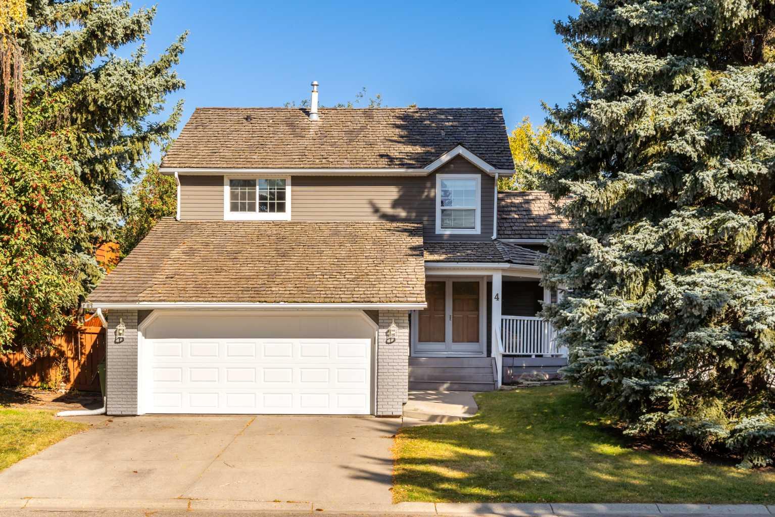 4 Wood Willow Pl SW, Calgary, AB T2W 4H5
