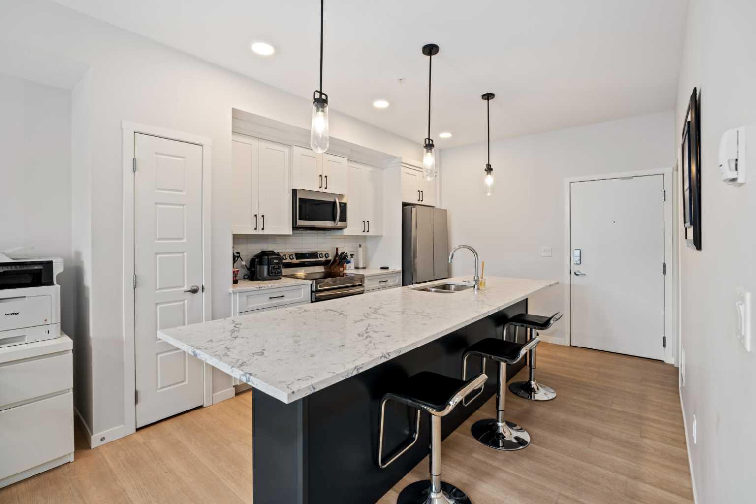 200 Harvest Hills Place Ne Unit 411, Calgary, AB T3K 2P4