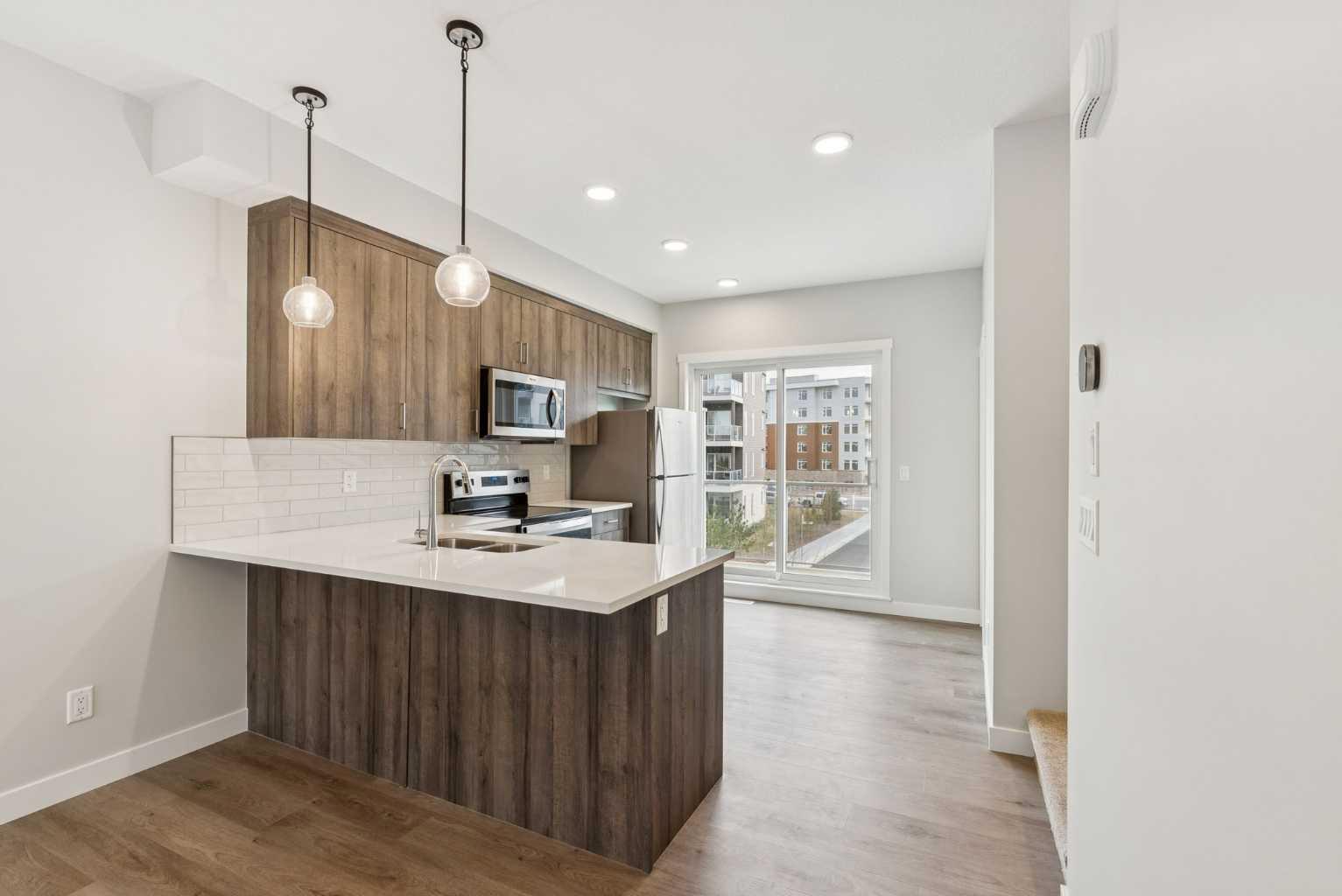 107 Shawnee Sq SW, Calgary, AB T2Y 0W4