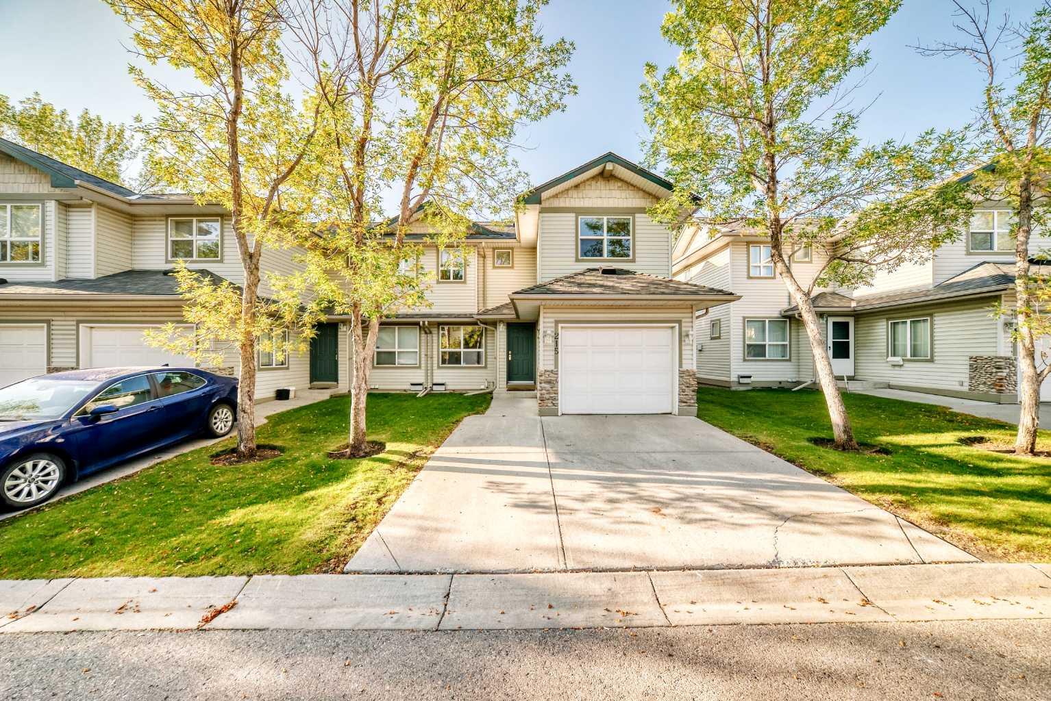 215 Harvest Gold Pl NE, Calgary, AB T3K 4Y1