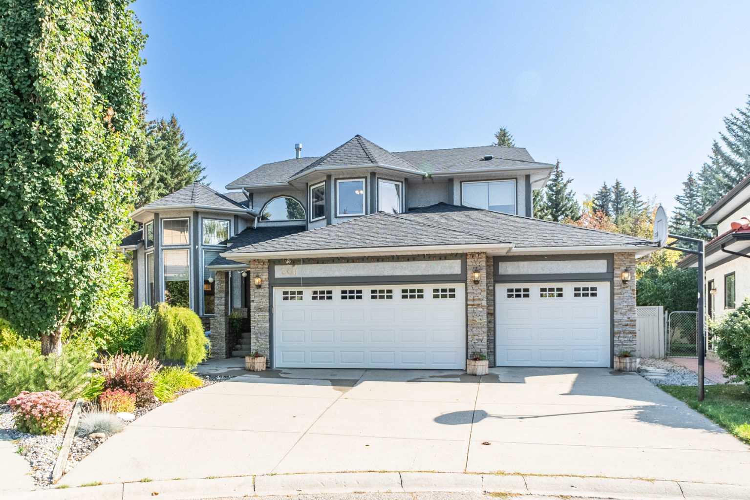 307 Woodhaven Bay SW, Calgary, AB T2W 5S2