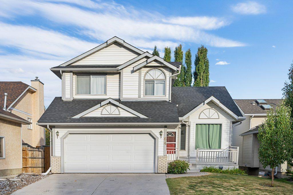 64 Woodmark Cres SW, Calgary, AB T2W 4Z2