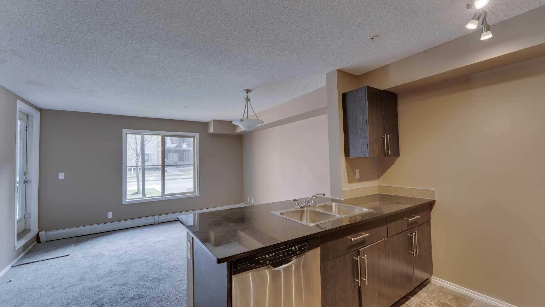 2715 12 Avenue Se Unit 105, Calgary, AB T2A 4X8