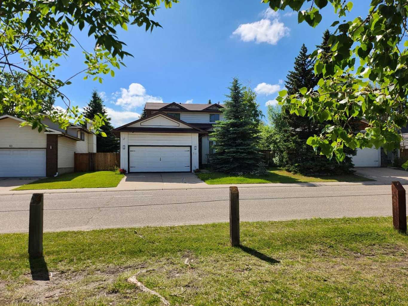 59 Woodmont Way SW, Calgary, AB T2W 4L7