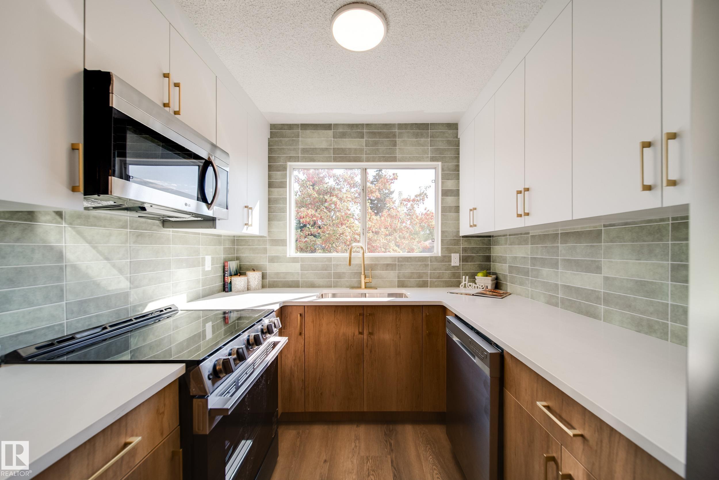 171 Av Nw Unit 9949 Ave, Edmonton, AB T5X 4X2