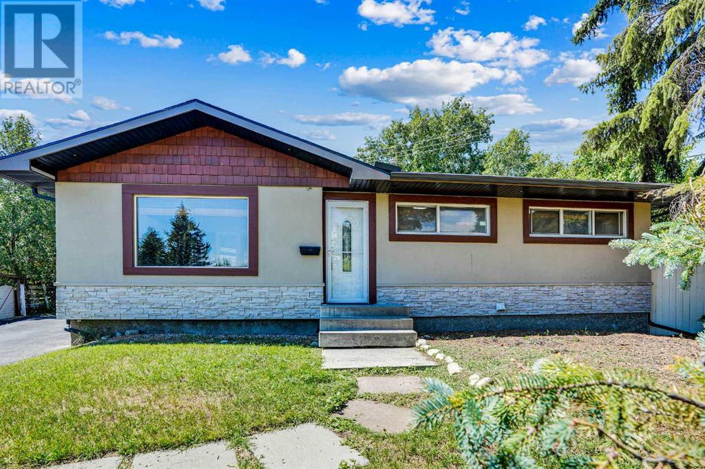 52 Harrow Cres SW, Calgary, AB T2V 3A9
