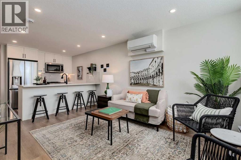 155 Crimson Ridge Place Nw Unit 105, Calgary, AB T3L 2M4
