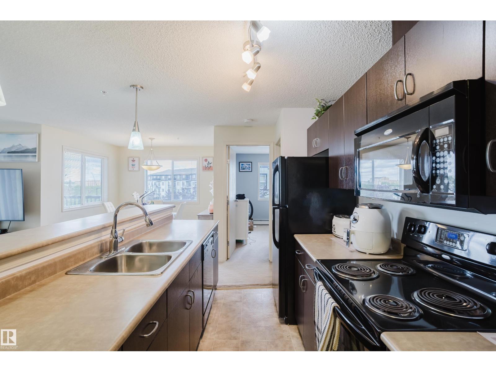 1188 Hyndman Road Northwest #302, Edmonton, AB T5A 0E9