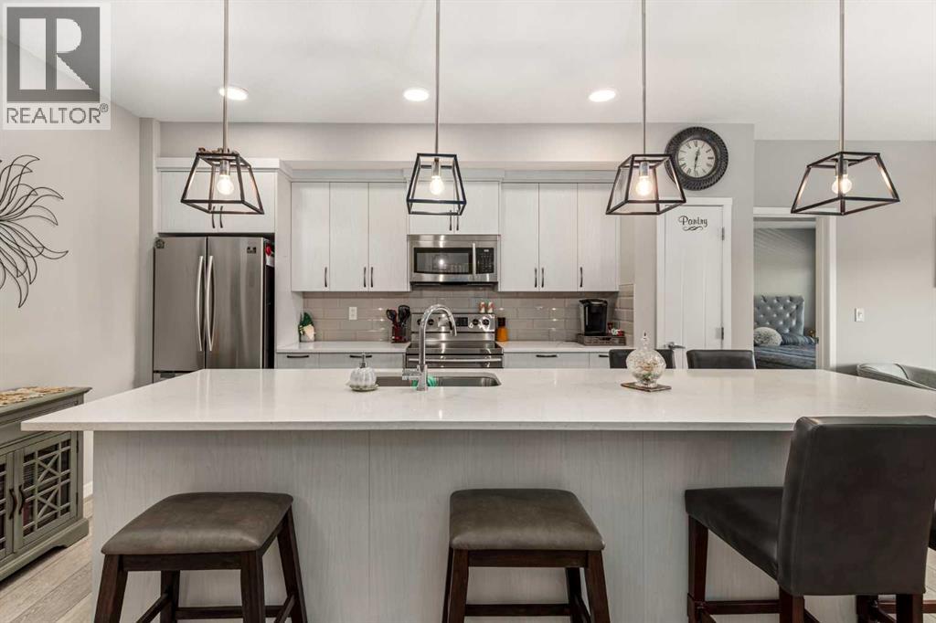 370 Harvest Hills Common Ne Unit 113, Calgary, AB T3K 2M8