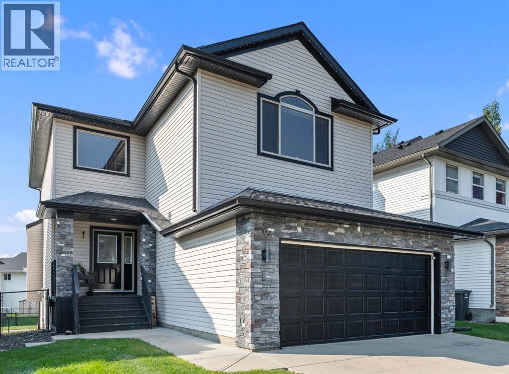 95 Crystal Shores Rd, Okotoks, AB T1S 2H9