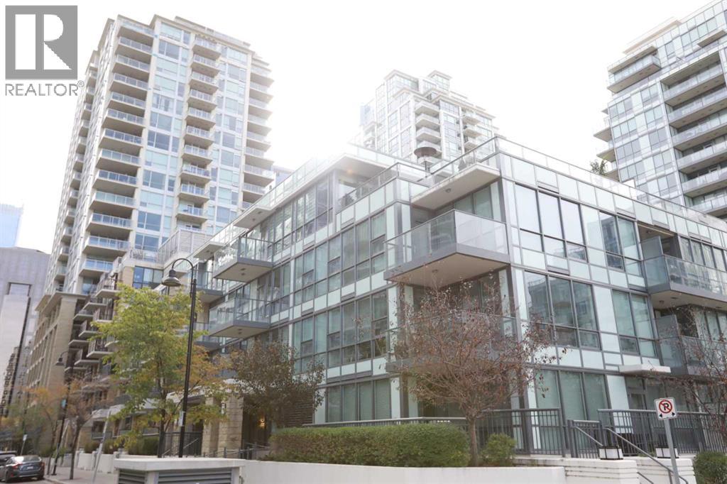 51 Waterfront Mews Sw Unit 304, Calgary, AB T2P 0X3