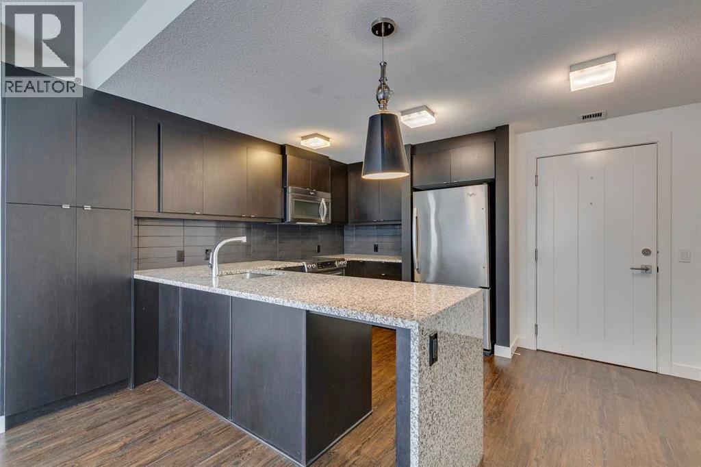 25 Aspenmont Heights Sw Unit 107, Calgary, AB T3H 0E4