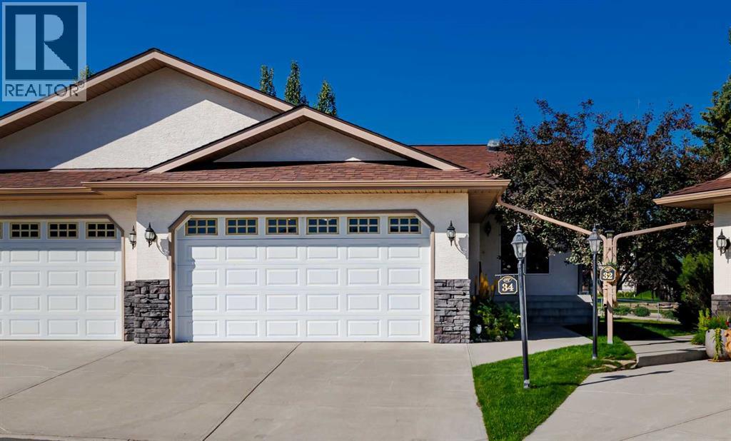 100 Sheep River Drive Unit 34, Okotoks, AB T1S 1V3