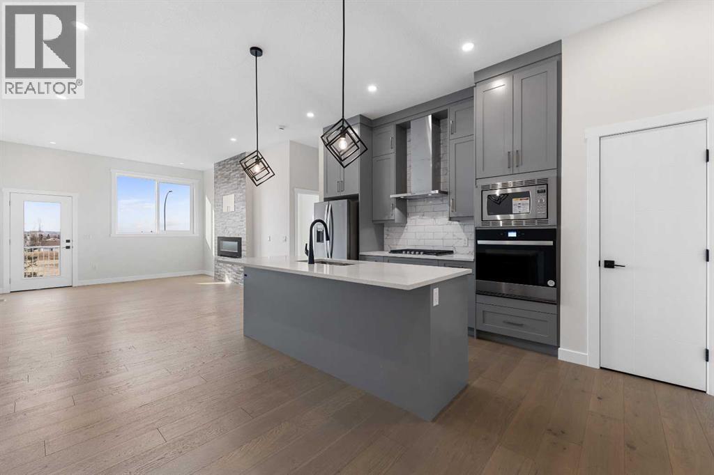 27 Wolf Cres, Okotoks, AB T1S 5V1