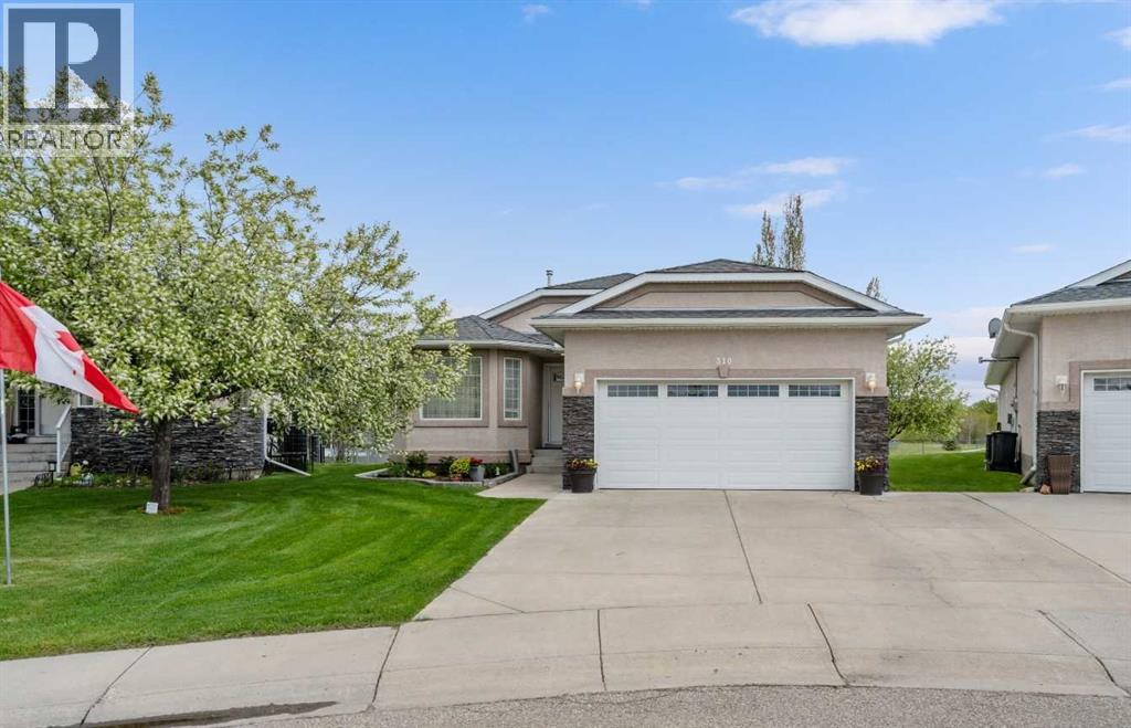 310 Riverside Gdn NW, High River, AB T1V 1Y9