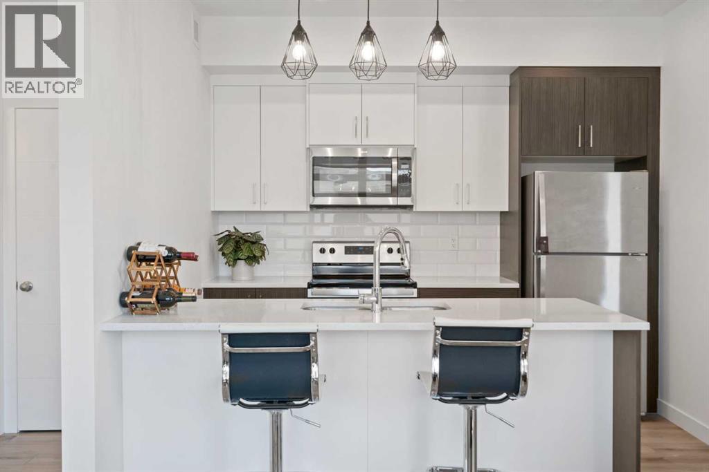 205 Spring Creek Common Sw Unit 217, Calgary, AB T3H 6E2