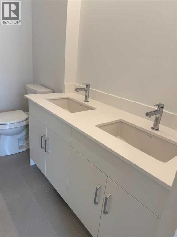 1453 Naa Drive Sw Unit 104, Calgary, AB T3H 6H7