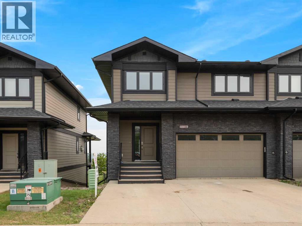 208 Sparrow Hawk Drive Unit 13, Fort Mcmurray, AB T9K 0Y8