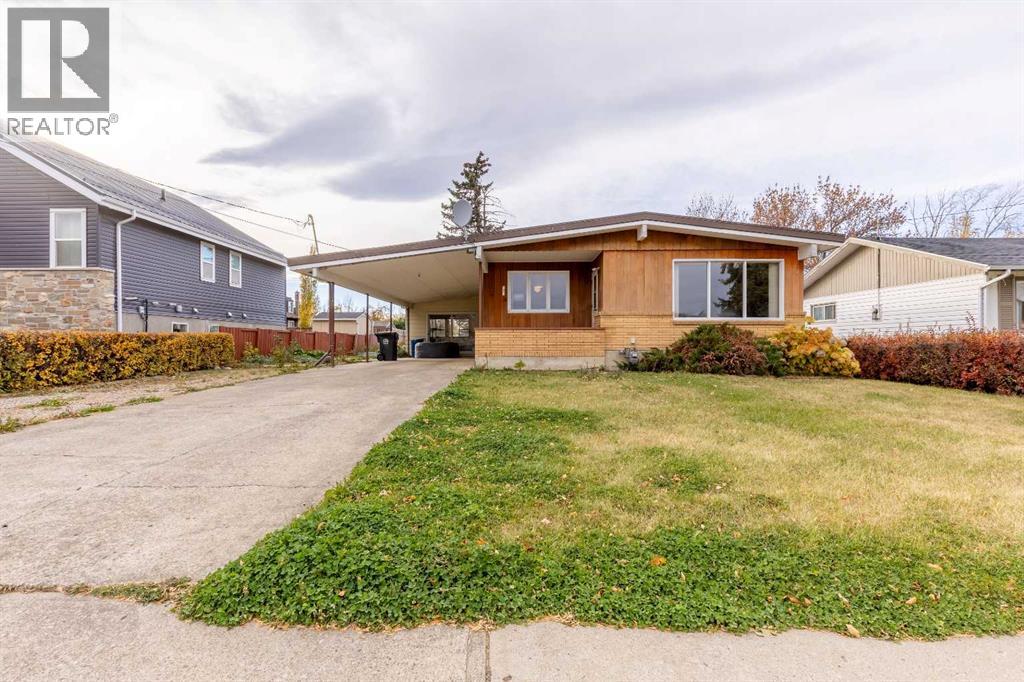 124 N 200 E, Raymond, AB T0K 2S0