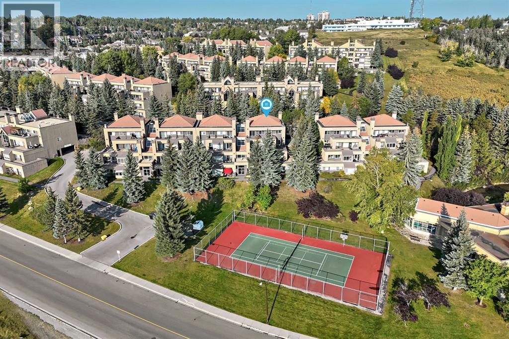 220 Village Terrace Sw Unit 8, Calgary, AB T3H 2L4