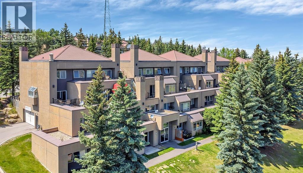 218 Village Terrace Sw Unit 8, Calgary, AB T3H 2L4