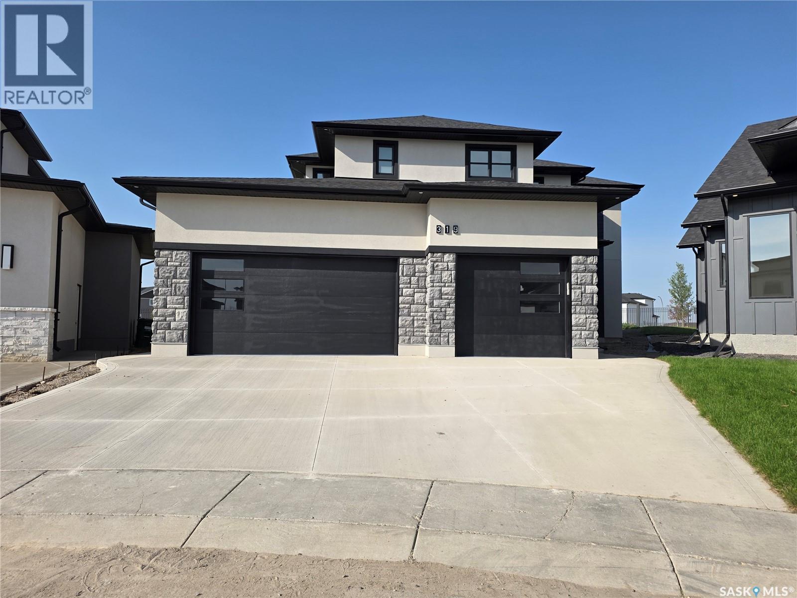 319 Woolf Bay, Saskatoon, SK S7W 1E5