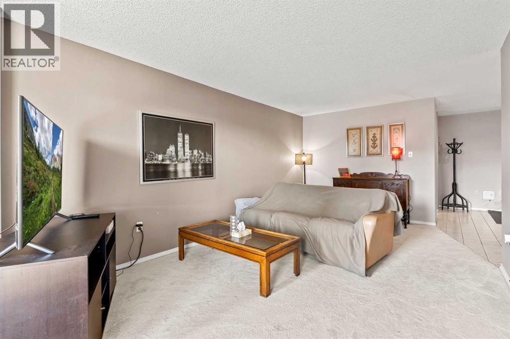 718 12 Avenue Sw Unit 704, Calgary, AB T2R 0H7