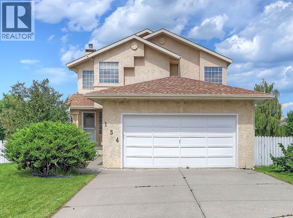 154 Sandarac Dr NW, Calgary, AB T3K 3V2