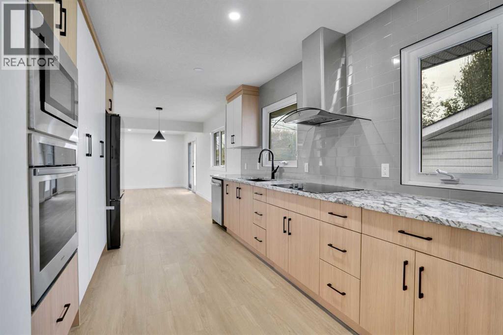 6116 Buckthorn Rd NW, Calgary, AB T2K 2Z1