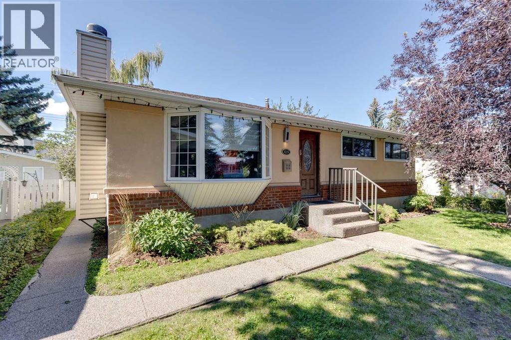 419 Woodland Cres SE, Calgary, AB T2J 1J7