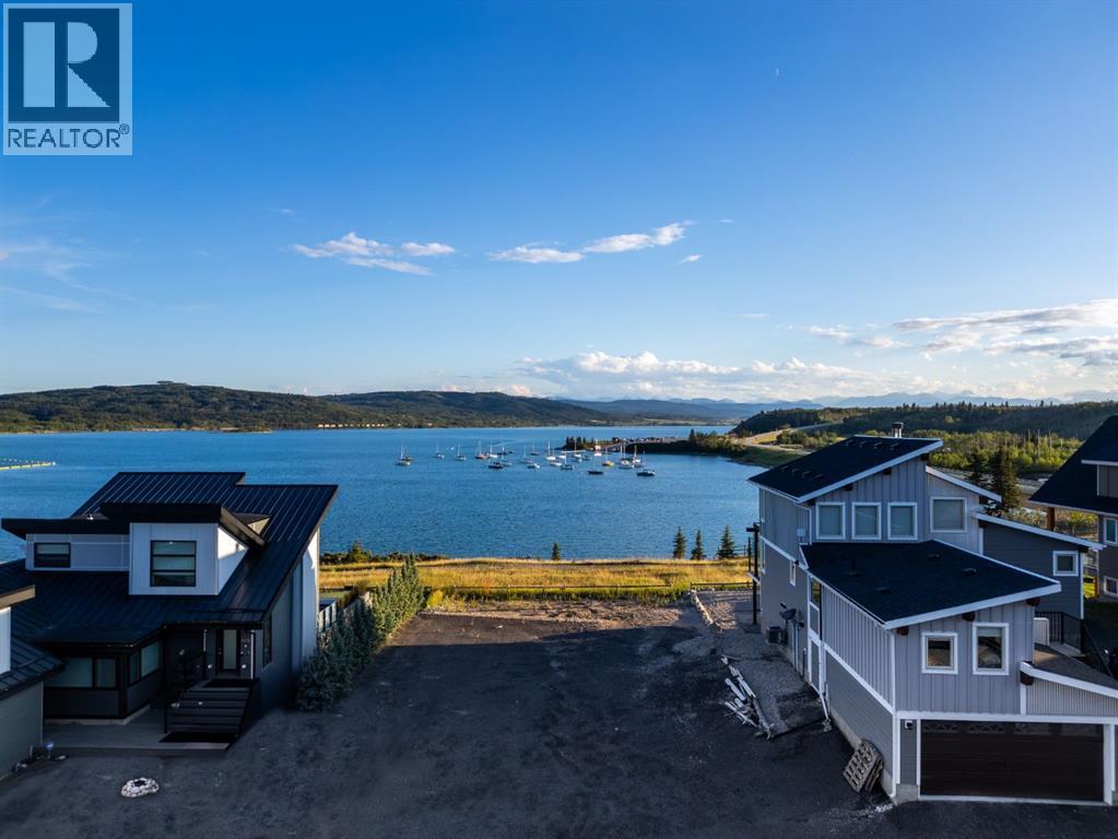 407 Cottage Club Grv, Rural Rocky View County, AB T4C 1B1