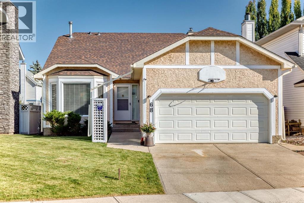 68 Woodmark Cres SW, Calgary, AB T2w 4z2