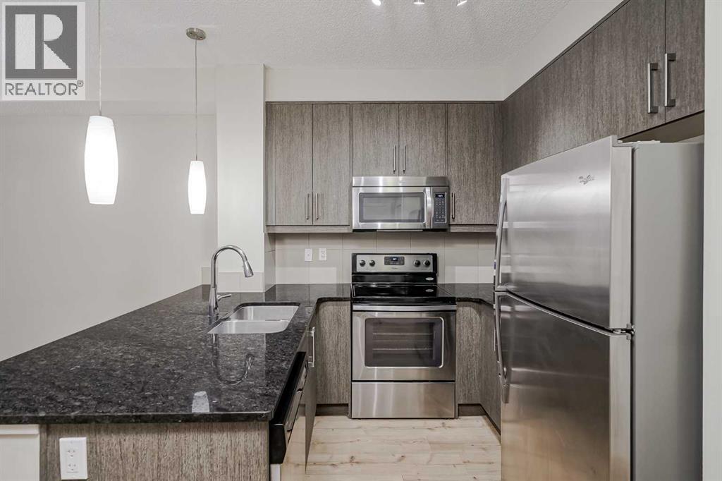 402 Marquis Lane Se Unit 205, Calgary, AB T3M 1M6