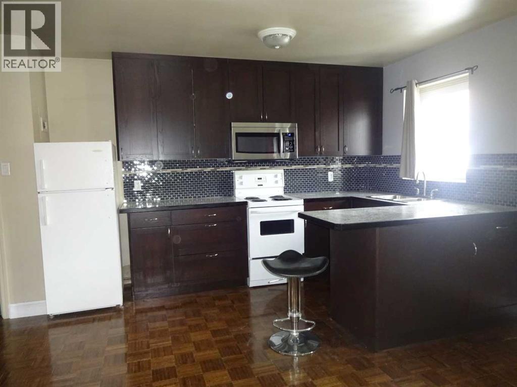 1027 12 Avenue Sw Unit 204, Calgary, AB T2R 0J5