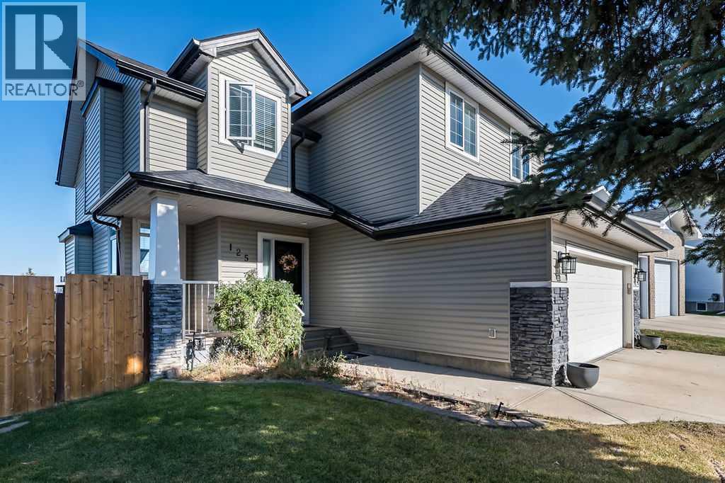 125 Cimarron Rise, Okotoks, AB T1S 1M7