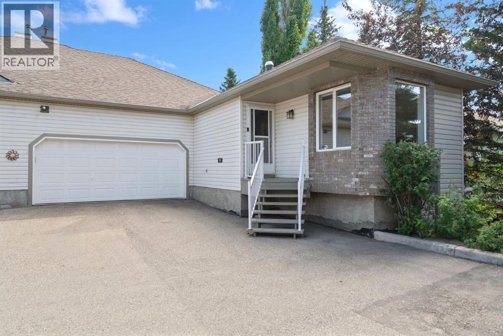 70 Mt Douglas Villas SE, Calgary, AB T2Z 3R5