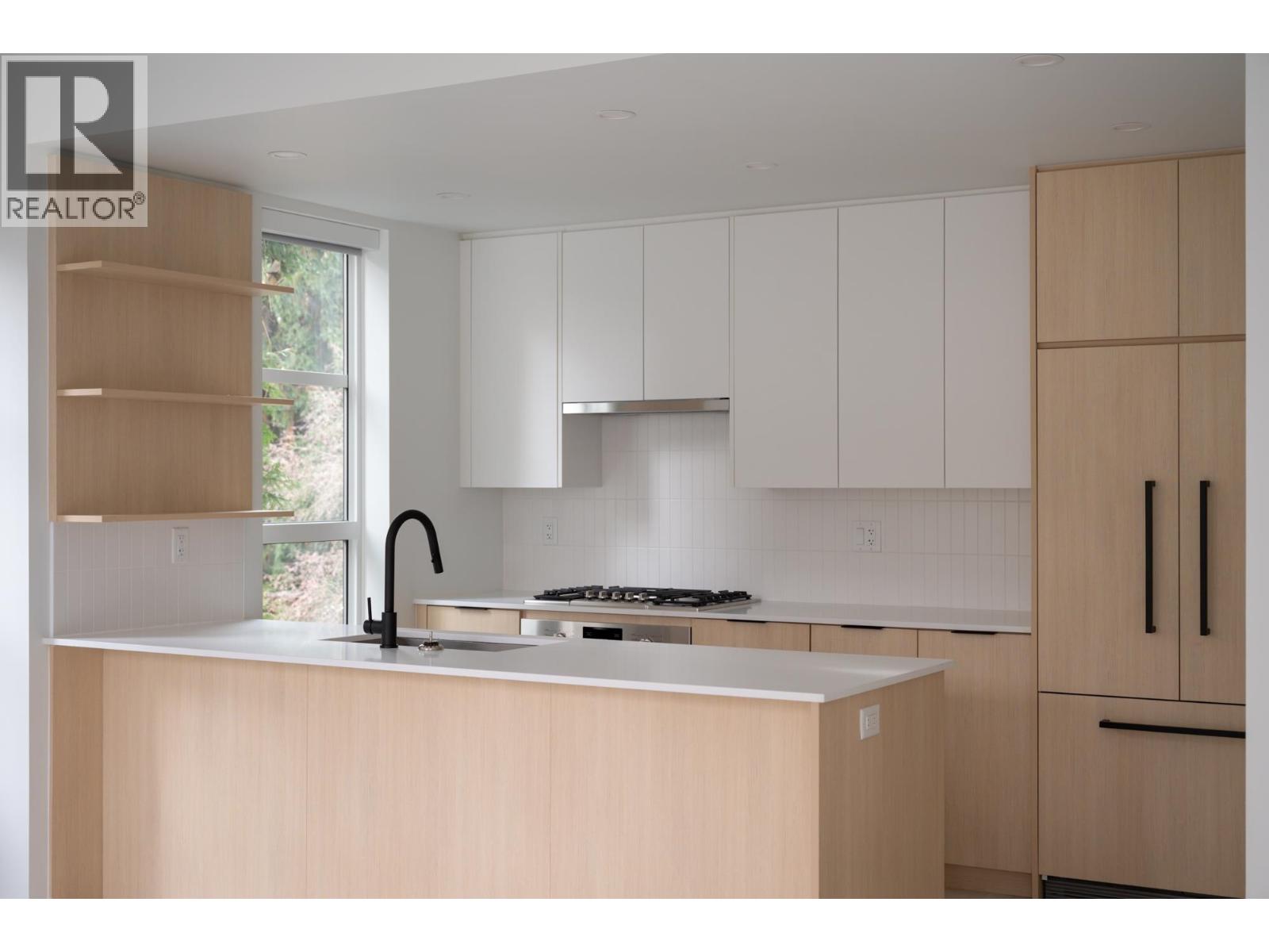 2045 Heritage Park Lane Unit 211, North Vancouver, BC V7H 0E3