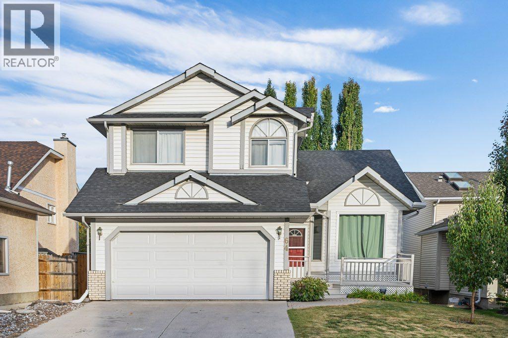 64 Woodmark Cres SW, Calgary, AB T2W 4Z2