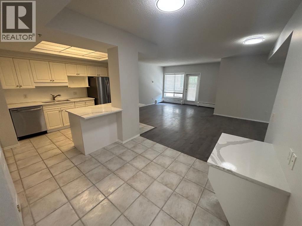 114 15 Avenue Sw Unit 205, Calgary, AB T2R 0P5