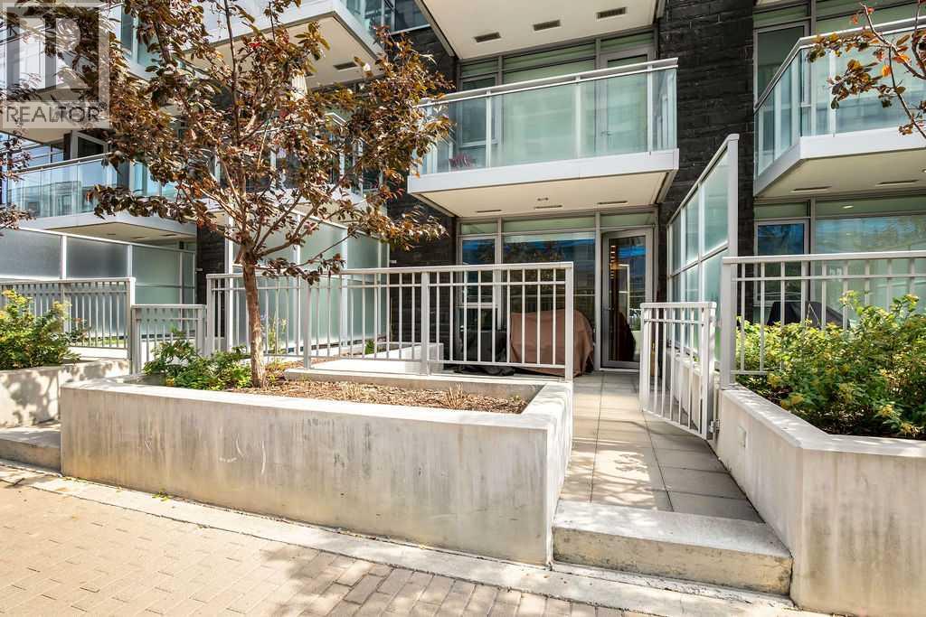 108 Waterfront Court Sw Unit 103, Calgary, AB T2P 1K7