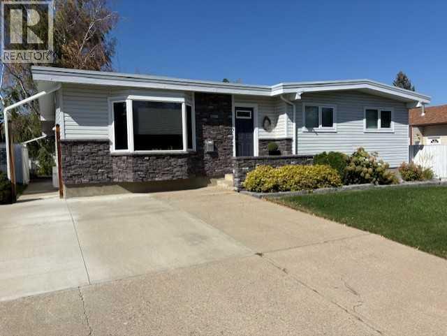 1406 Lakemount Blvd S, Lethbridge, AB T1K 3K4