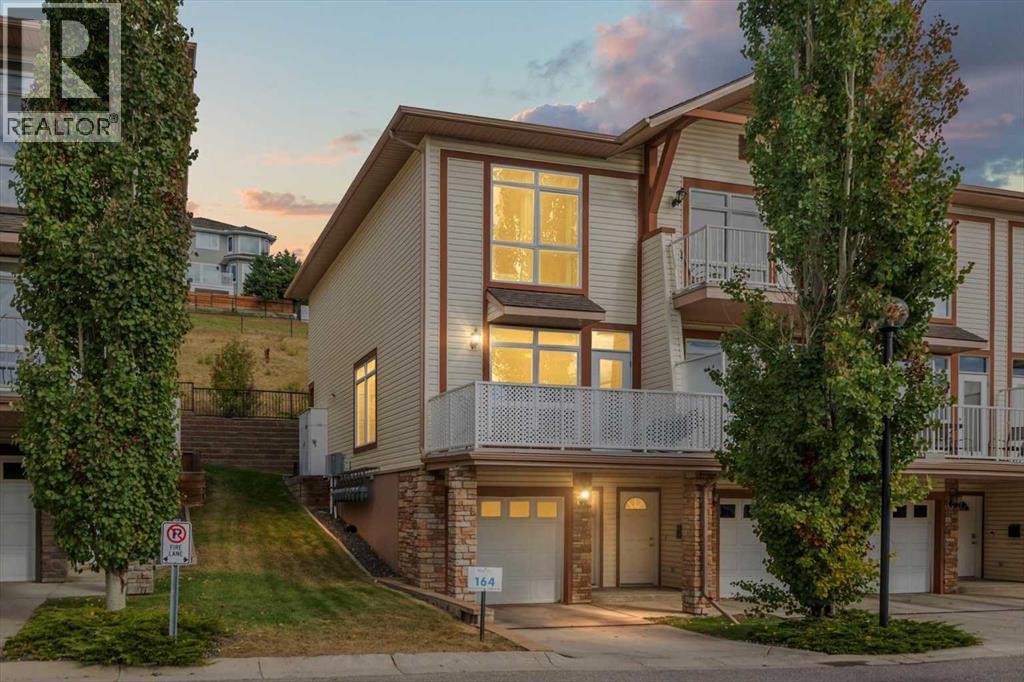 164 Rockyledge View Nw Unit 1, Calgary, AB T3G 6B2