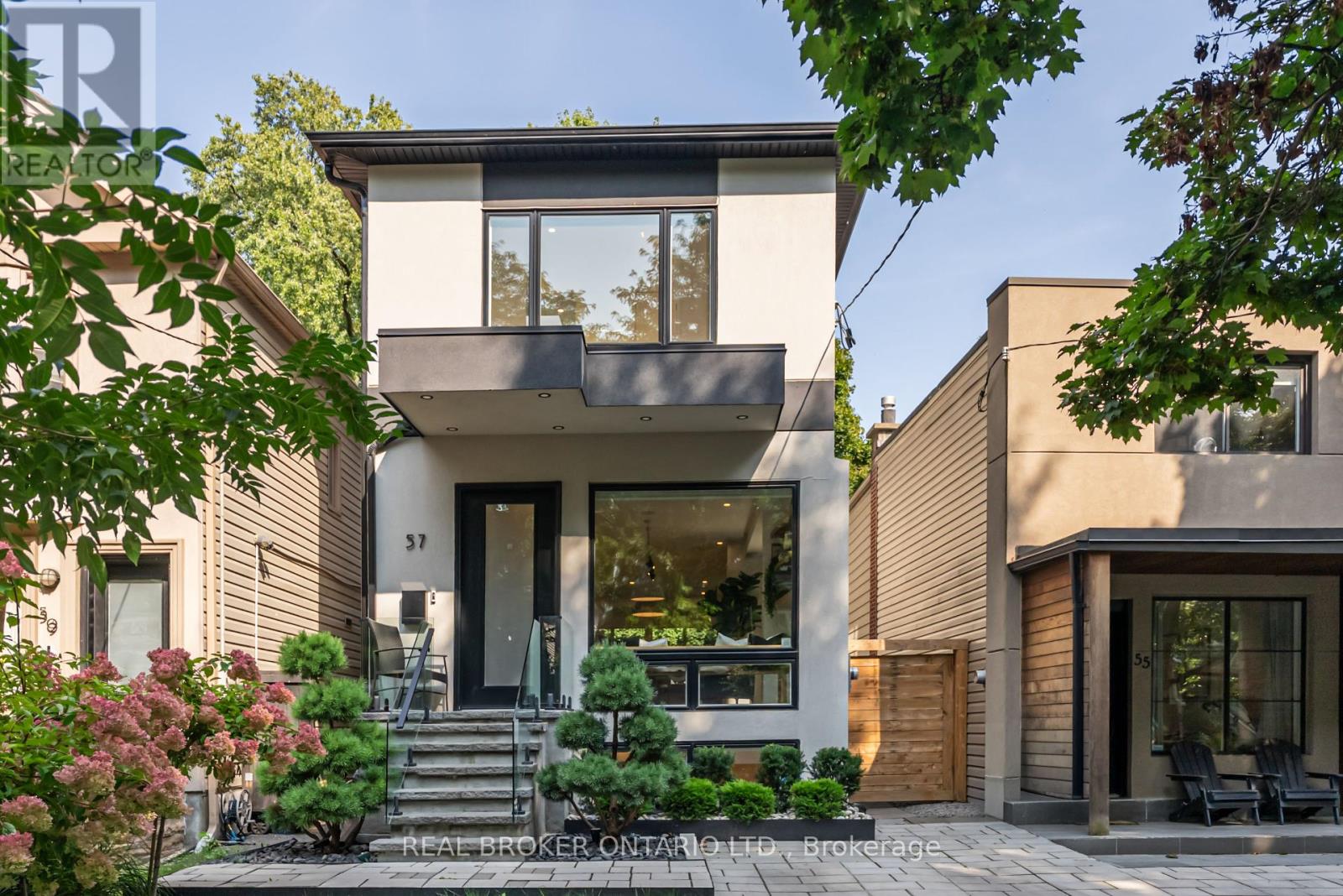 57 Rhodes Ave, Toronto, ON M4L 2Z8